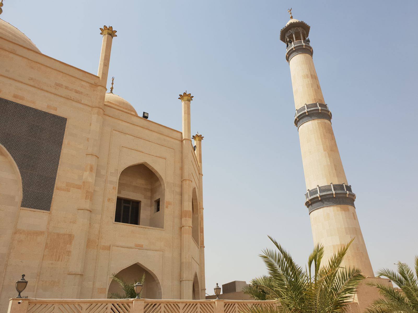 Siddiqa Fatima Zahra Mosque — exterior minaret and entrance facade
